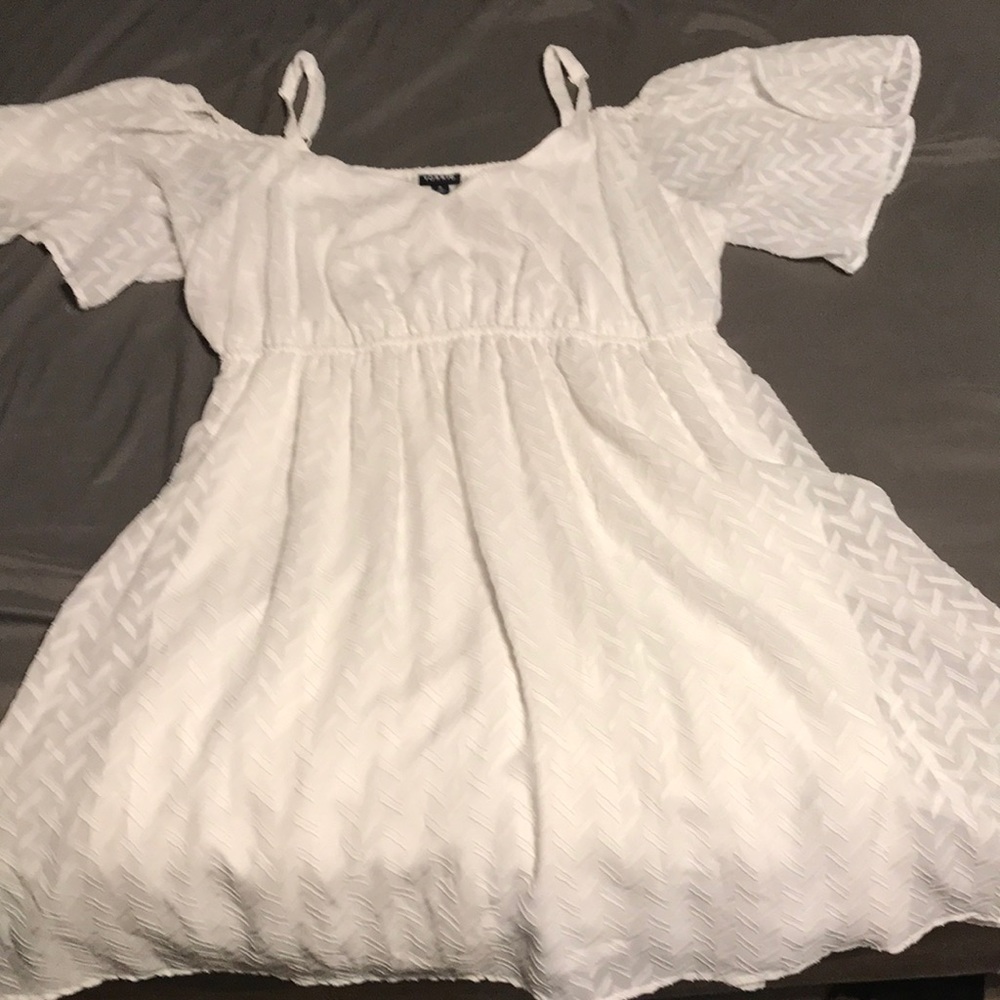 White flowy textured dress with cinched waist